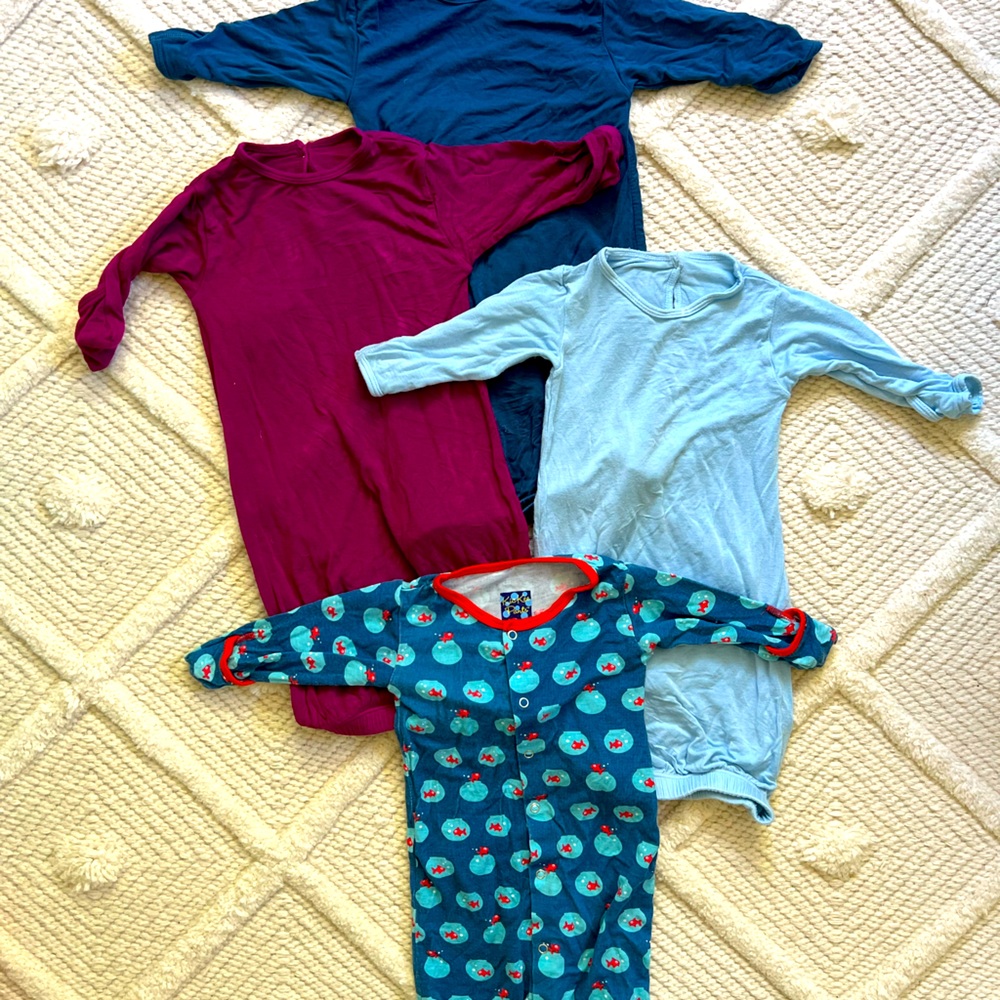 Five Kickee Pants footless baby pajamas (one not pictures) Sizes: N-6mo